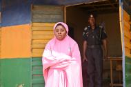 Caption: Hadiza in her community. Photo: Women for Women International  