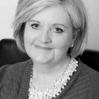 picture of a woman with blonde hair smiling at the camera (Elizabeth Padmore)