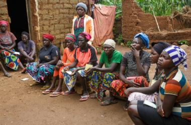 Women sitting together forlorn 