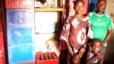 Sukari with her family. Photo: Women for Women International