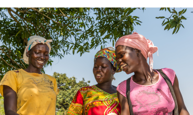 Neema and two other participants are pictured in their social empowerment training on bakery skills.