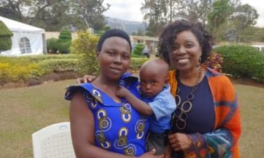 Beverly, Jacqueline, and Jacqueline's son stand together