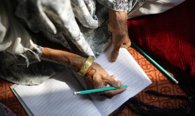 Woman practicing numeracy in class